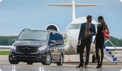 Yellow Star Express van and travelers beside an aircraft — Utah taxi and airport transportation